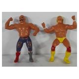 Two action figures, Hulk Hogan and The Iron Sheik