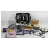 Group of mostly blank CDs