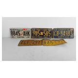 Five license plates, includes four Pennsylvania