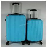 Two hard sided luggage cases on wheels,