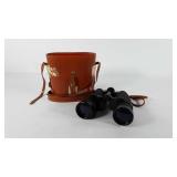 Binoculars with leather case, case shows wear