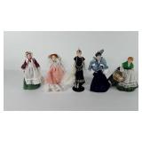Five small porcelain dolls with stands, 8.5"-9"
