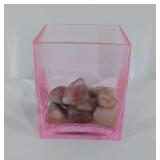 Quartz tumbled stones in square pink glass vase
