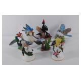 Group of seven porcelain bird figurines and