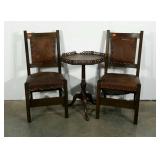 Accent table with two leather upholstered chairs,