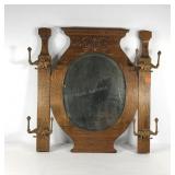 Oak hall beveled mirror with four double coat