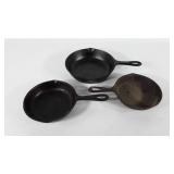 Three cast iron skillets, 6.5", 6 5/8", and 8.5"