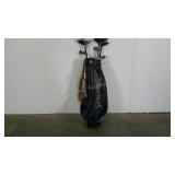 Spaulding golf bag with clubs