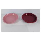 Two glazed pottery pie plates,  Henn and