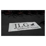 JL Saddlery and Apparel metal sign