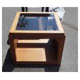 Glass and wood coffee table,  finish wear