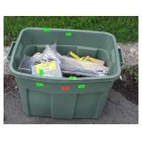 Green tote with Hardware, chemicals, nails,