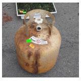 Taller partial filled propane tank