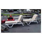 Two White poly Poolside Chaise Lounge Chairs with