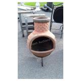 Terracotta Chimneyola Firepit with iron stand