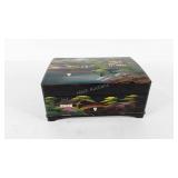 Painted cigarette music box, paint is chipping