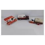 Three Trustworthy Hardware toy/bank trucks