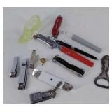 Group of household items, vegetable peeler, nail