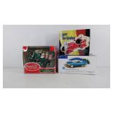 Group of three model cars in original boxes,