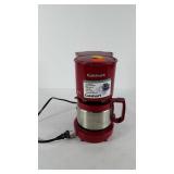 Cuisinart 4-cup coffee maker with cup, powers up