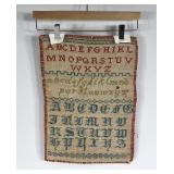 Early needlework sampler, signed MS 1912,