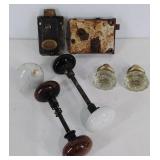 Group of old door knobs and locks