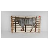 Farmhouse cow wall hanging, shows some weathering