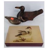 Two duck figures, brass and wood, plus men