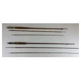 Two bamboo fishing poles  approx 8-9ft one is