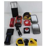 Group of tape measures, stud sensors and more