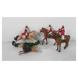 Four fox hunt themed Christmas ornaments, all