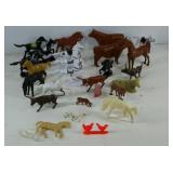 Group of plastic toy animals mostly horses and