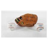 Baseball Mitt and two Rawlings Official League