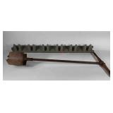 Post hole digger and Suncast wall mounted tool