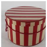 Red and white striped hat box