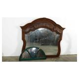 Two decorative mirrors, large mirror measures 48