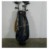 Spaulding golf bag with clubs