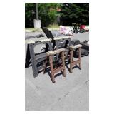 Group of four saw horses, wood ones do show use