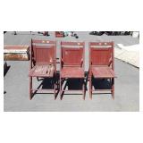 Three wooden folding chairs