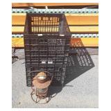Two plastic crates and lantern