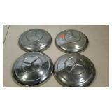 Four Mercedes hubcaps, 9 1/2"