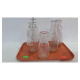 5 Dairy bottles - 4 qt size, and 1 pint size, some