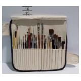 Artists brushes in canvas holder