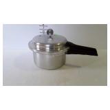 Mirror-Matic pressure cooker with weight