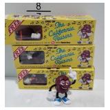 4 California Raisins figures in 3 boxes