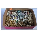 Flat of costume jewelry