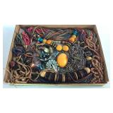 Flat of costume jewelry