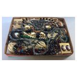 Flat of costume jewelry