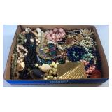 Flat of costume jewelry