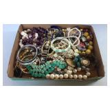 Flat of costume jewelry